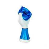A handheld electric facial cleansing brush with a translucent blue and white design, shown against a plain white background.