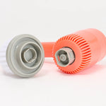 Orange and gray cleaning tool on a white background