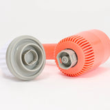 Orange and gray cleaning tool on a white background